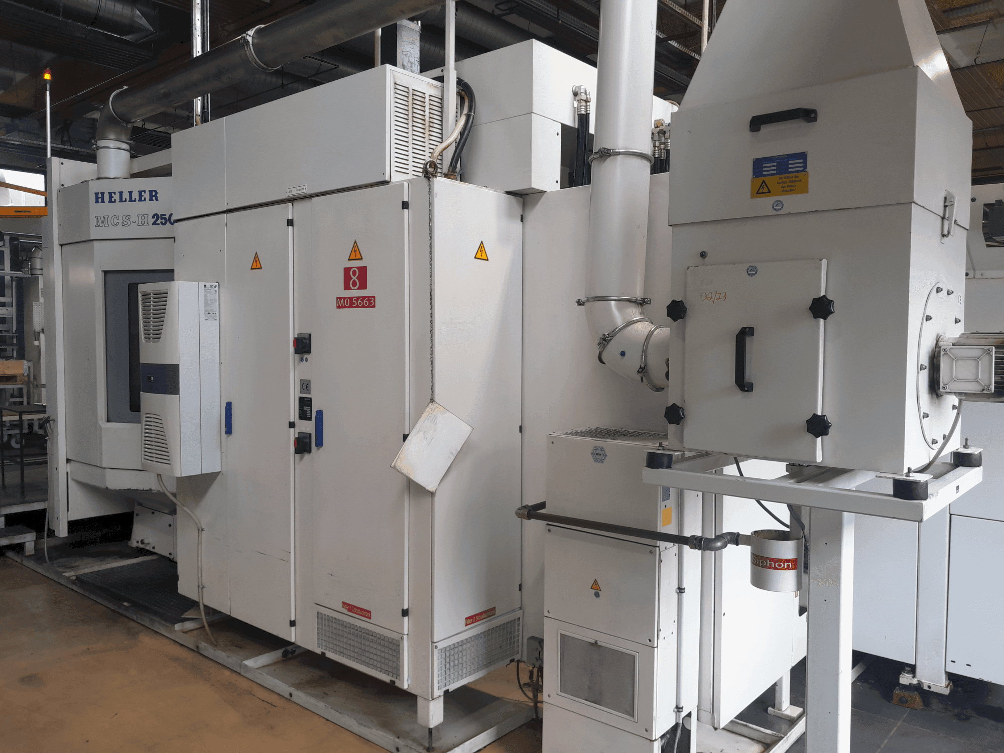 Vue de face de la machine HELLER MCS-H 250