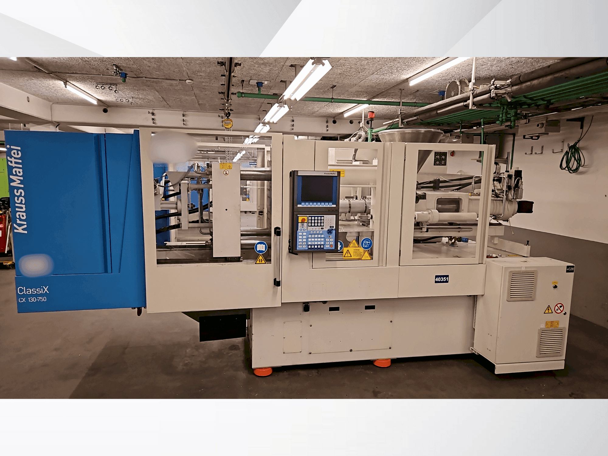 Vue de face de la machine Krauss Maffei 130-750 CX