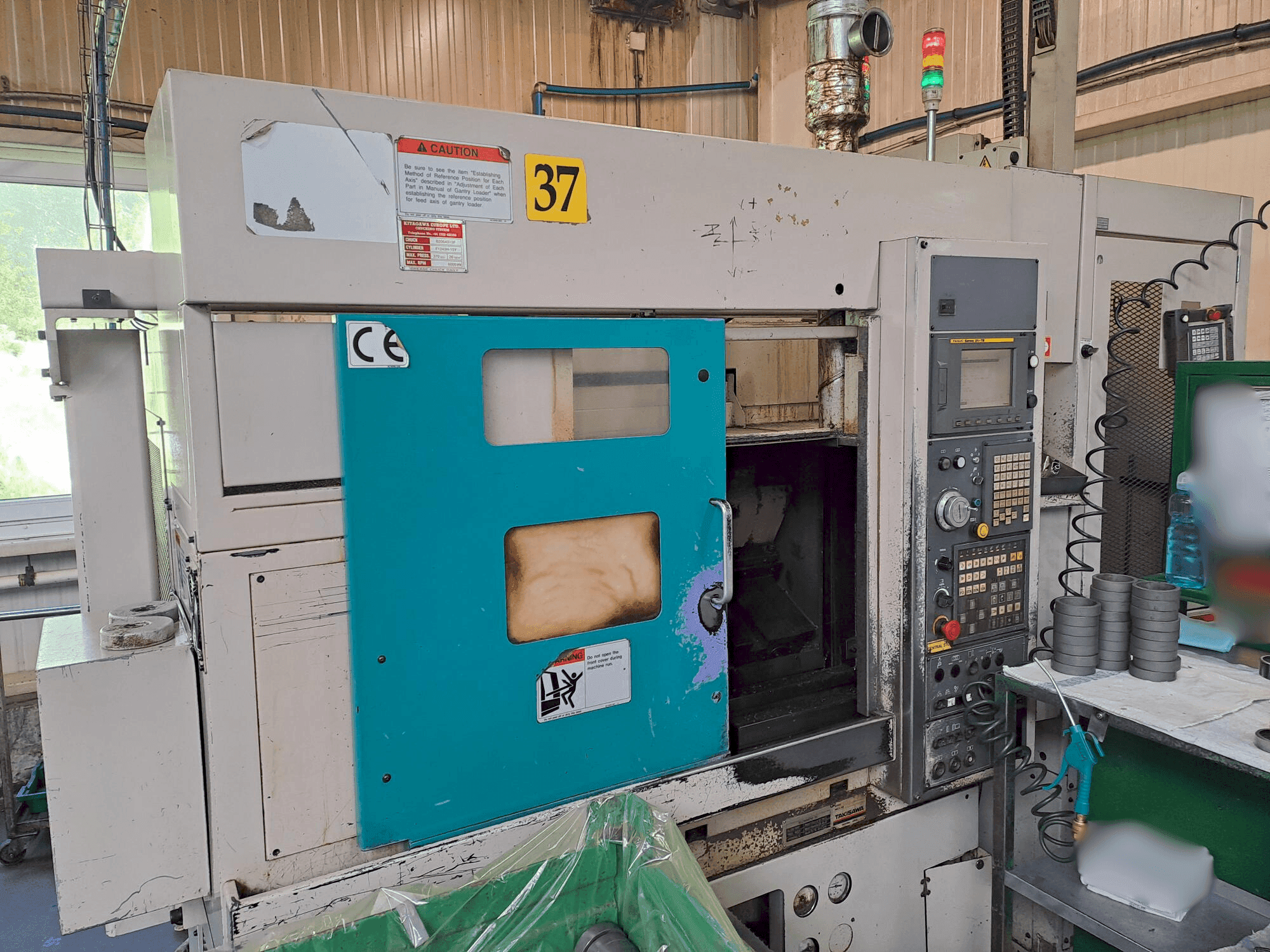 Vue de face de la machine Takisawa TC 200