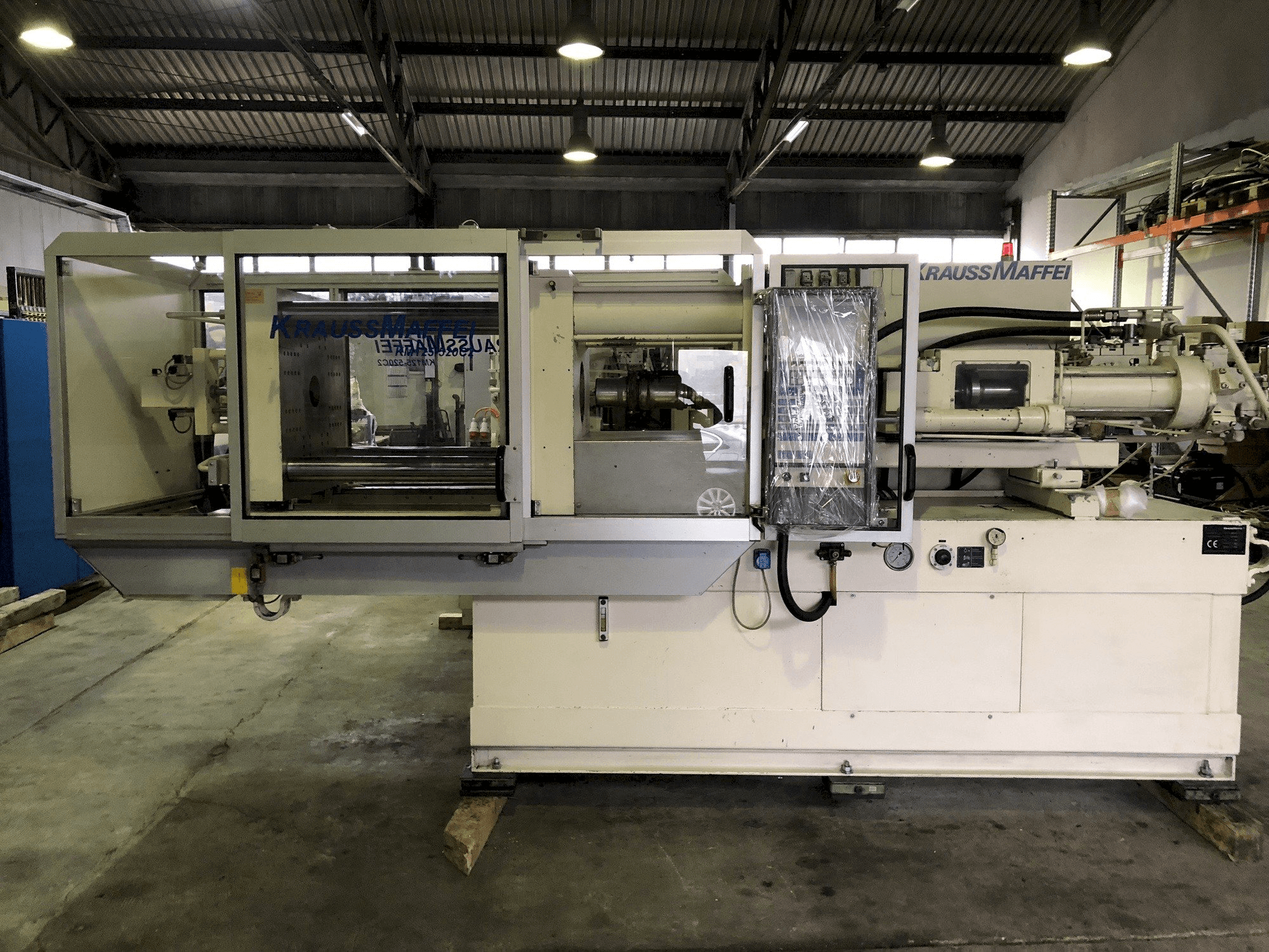 Front view of Krauss Maffei 125-520 machine