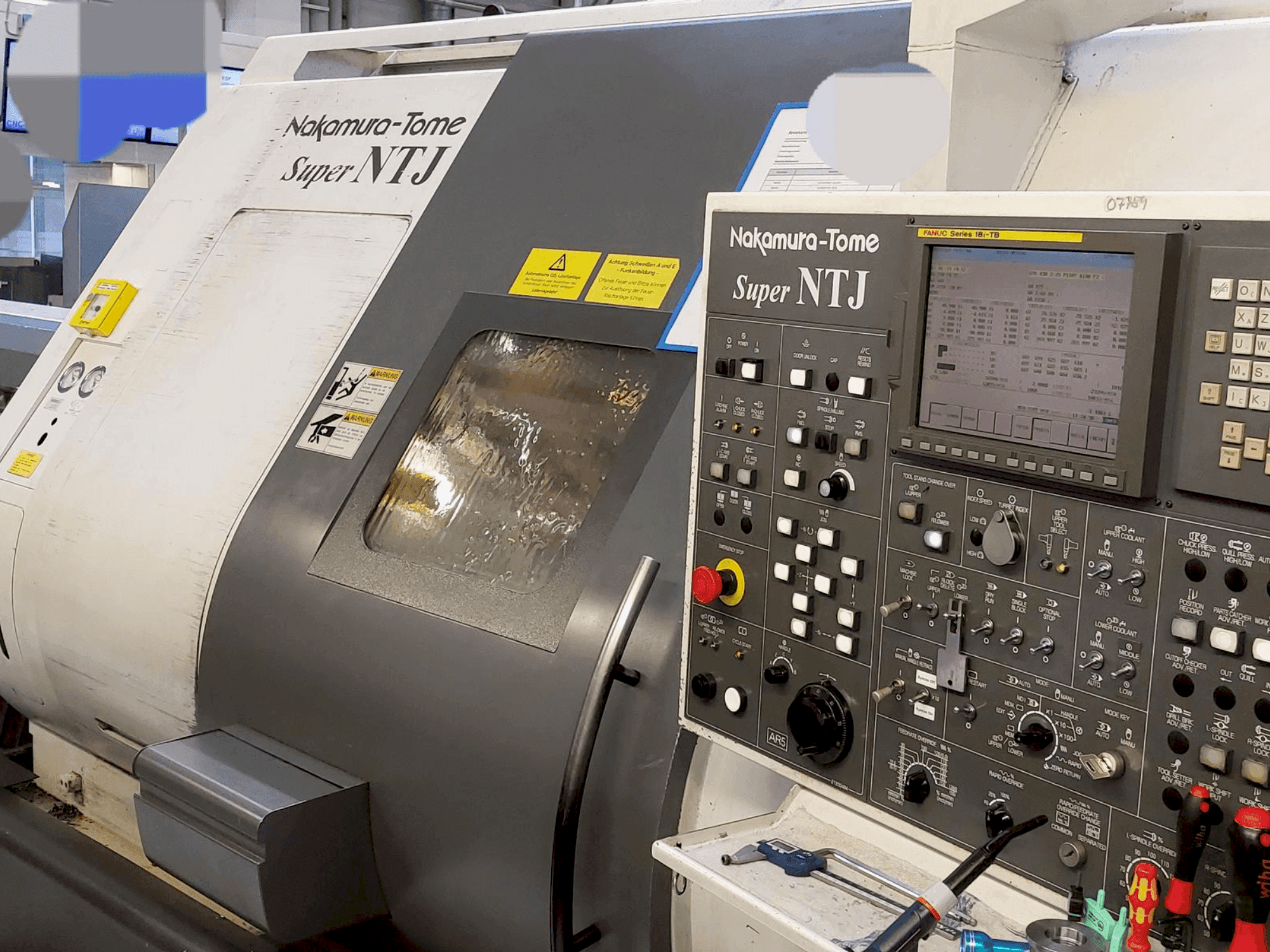 Vue de face de la machine NAKAMURA Super NTJ (2006)