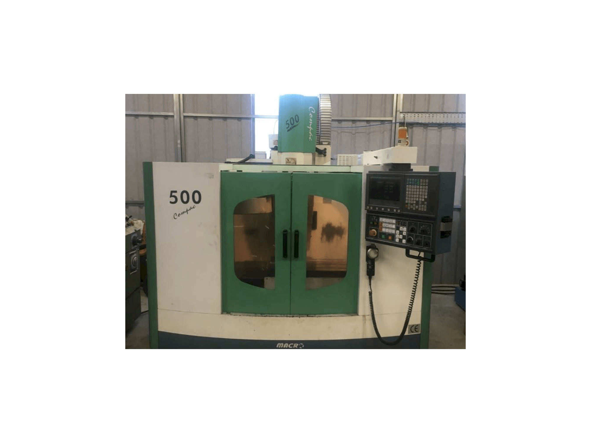 Front view of Macro Micro Tech Compac 500 machine