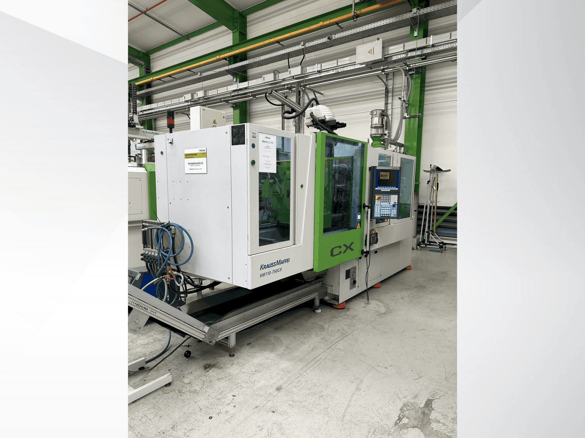 Vue de face de la machine Krauss Maffei 110-750 CX