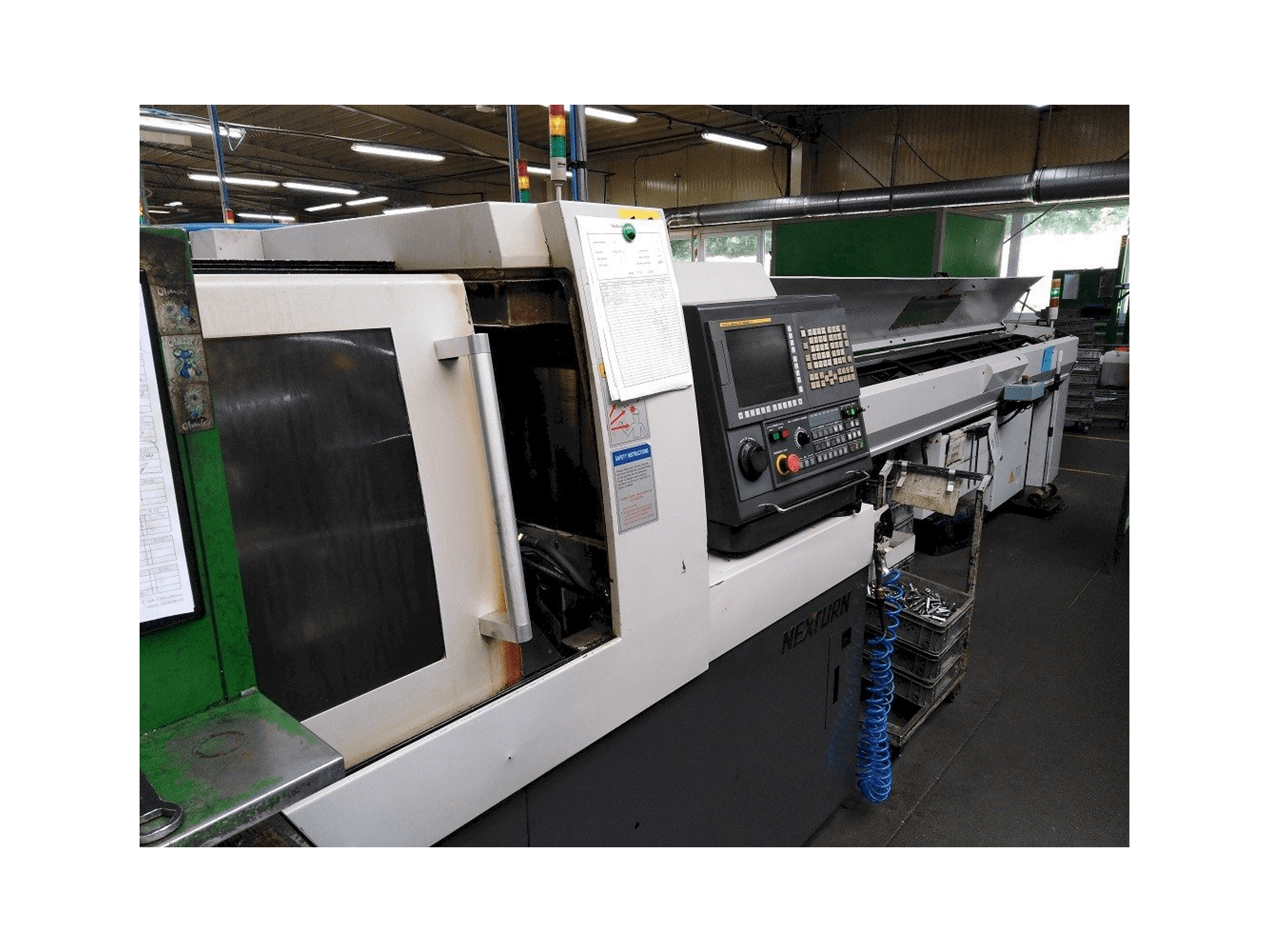 Front view of Nexturn SA-20E machine