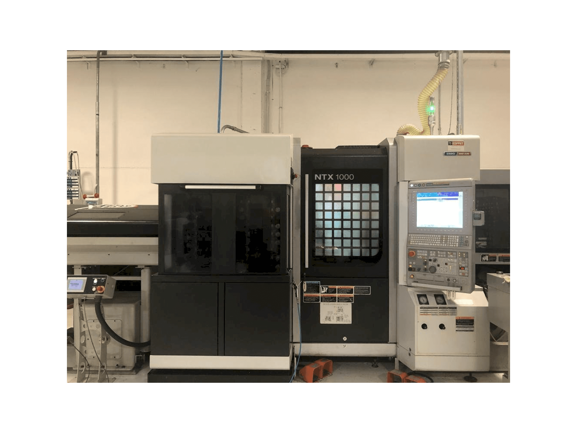 Front view of MORI SEIKI NTX1000 machine