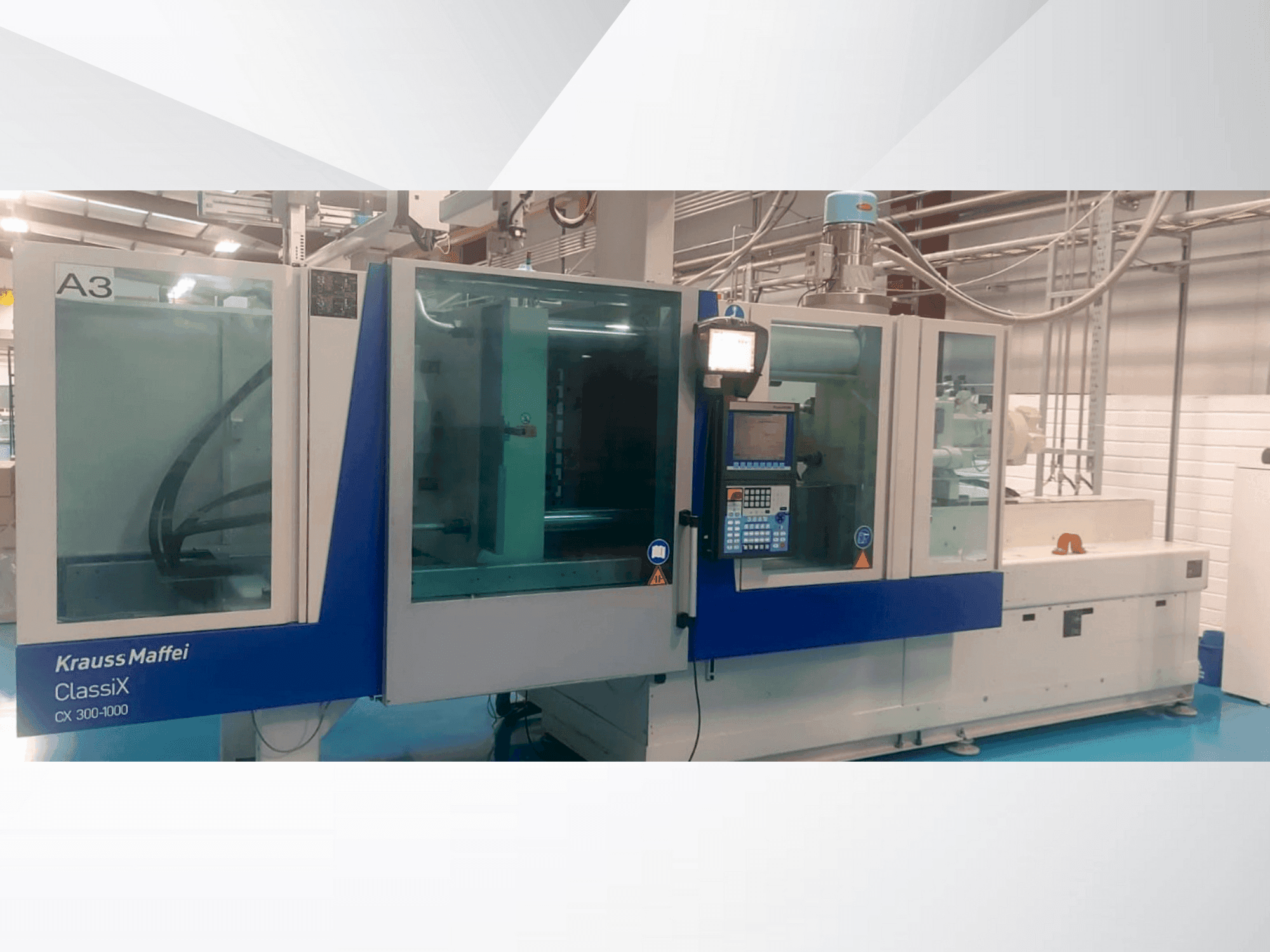 Vue de face de la machine Krauss Maffei ClassiX 300-1000 CX